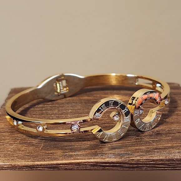 Jewelry - Gold Tone Women’s Spiral Accent Bracelet with Crystal Details